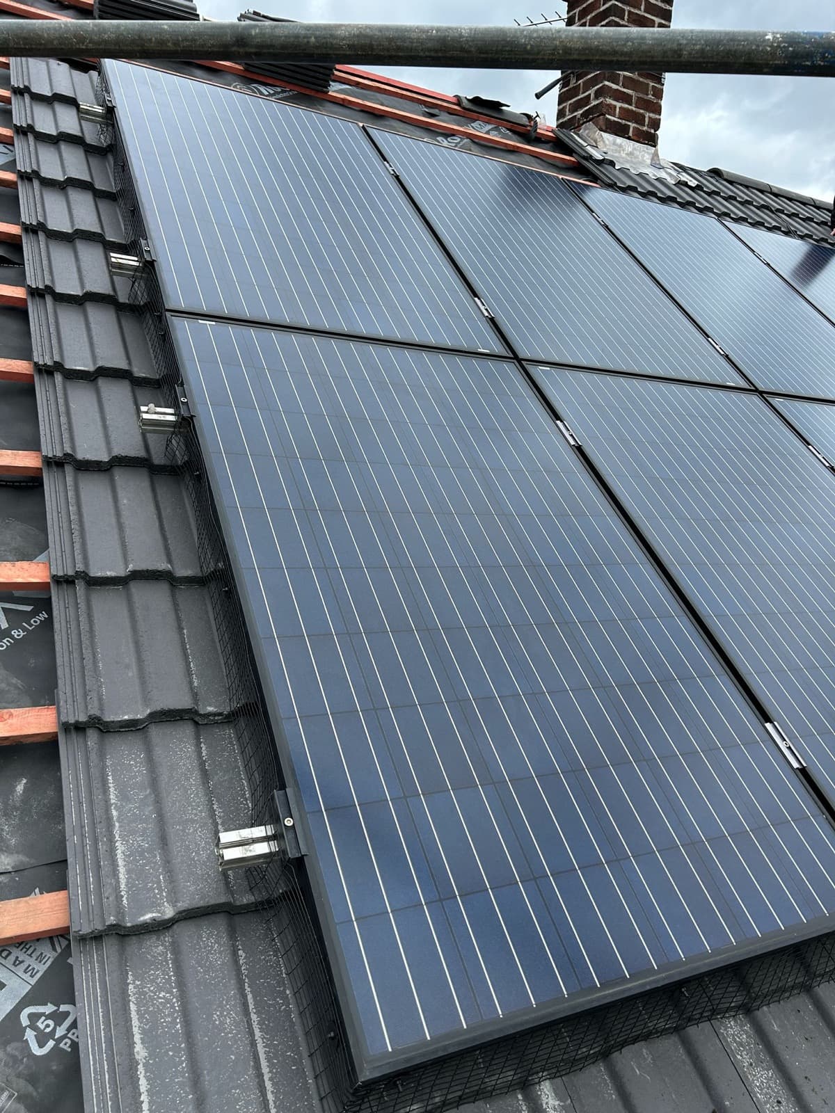 Solar PV panels fitted to a domestic pitched tiled roof